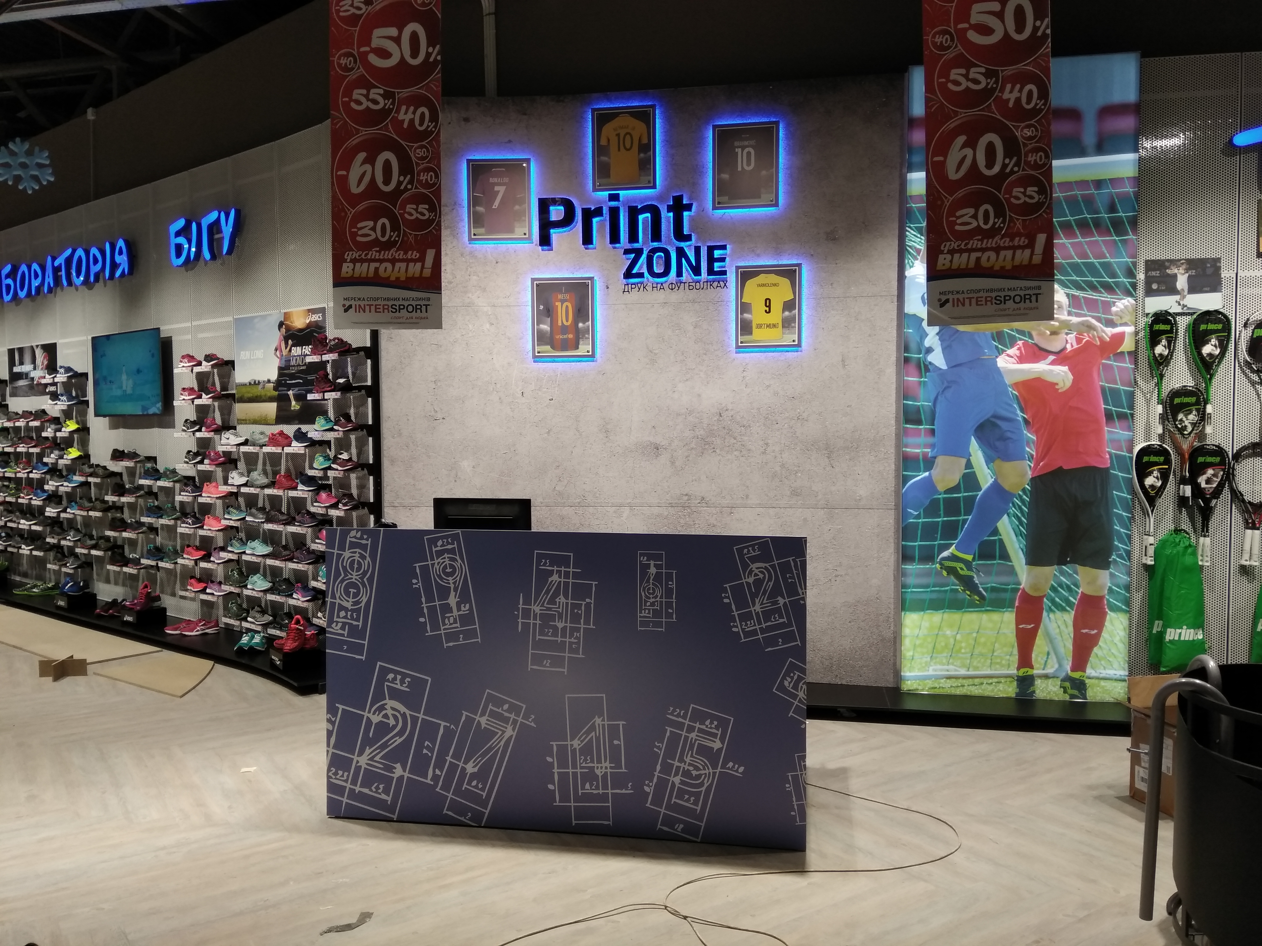 Створення та монтаж інтер’єрного оформлення для магазину InterSport